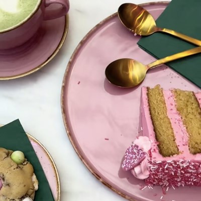 Cafe Fleure food items - cake, matcha coffee and biscuits